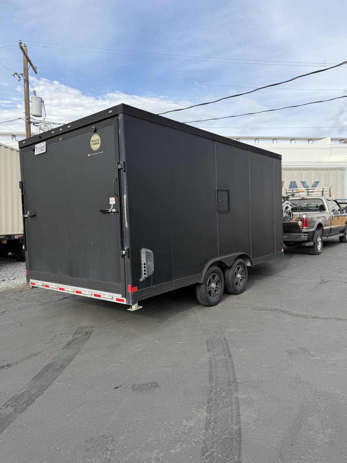 Enclosed cargo trailer at Tire Pros Shop in Logan, Utah, ready for trailer tire service